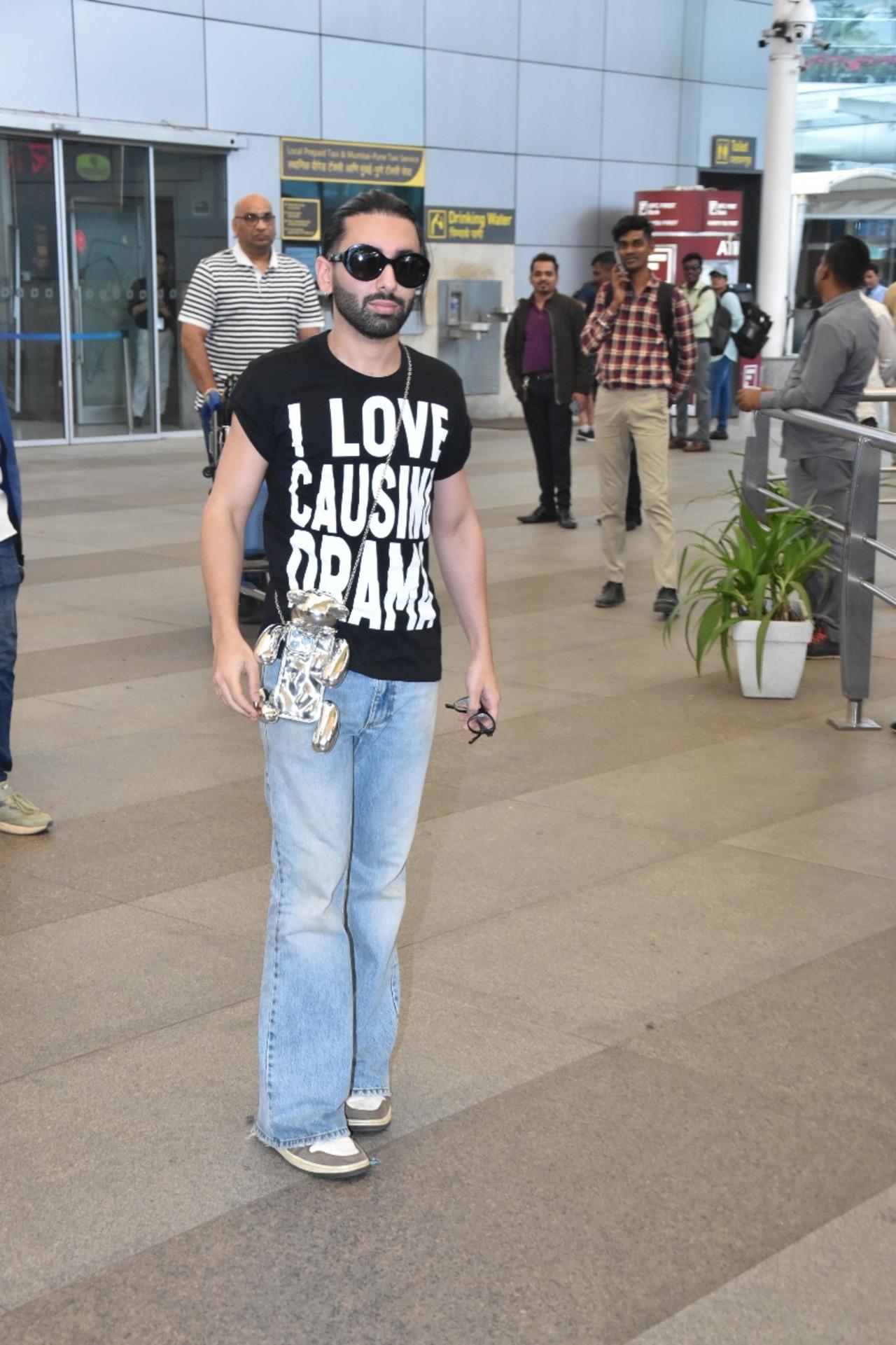 Orry was photographed as usual wearing his really stylish attire. When he was seen at the airport, he was sporting a black t-shirt that said, 'I love causing drama,' along with baggy blue jeans and black shades as accessories. He, too, was returning from the Filmfare Awards in Gujarat